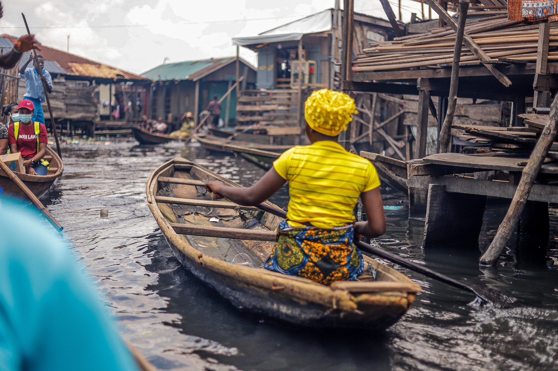 A women paddling a boat in Nigeria 