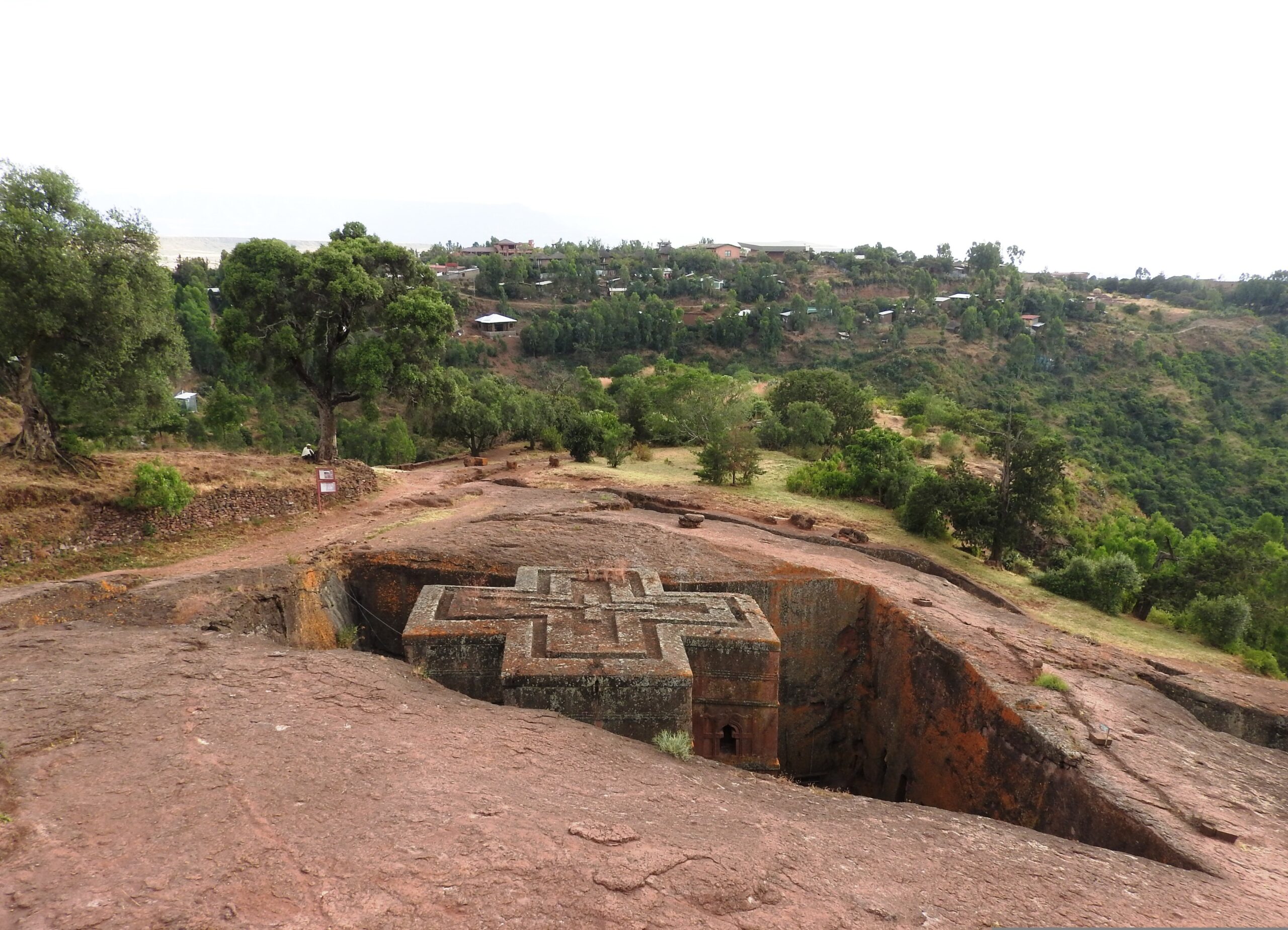 Ethiopian Orthodox rock-hewn church surrounded by vegetation at Lalibela, Ethiopia.