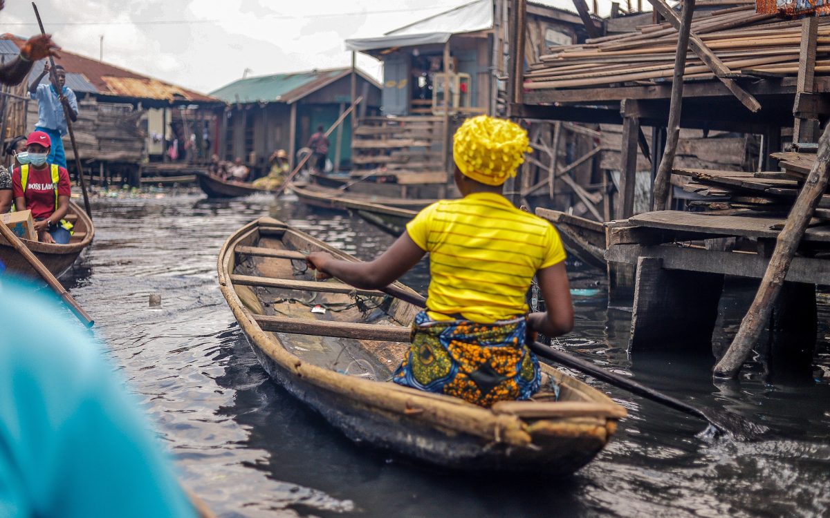 A women paddling a boat in Nigeria 